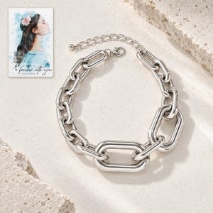 silver tone Arc Statement Choker shown on a clean white catalog background for an unobstructed product view. A personalized digital greeting card is shown alongside.