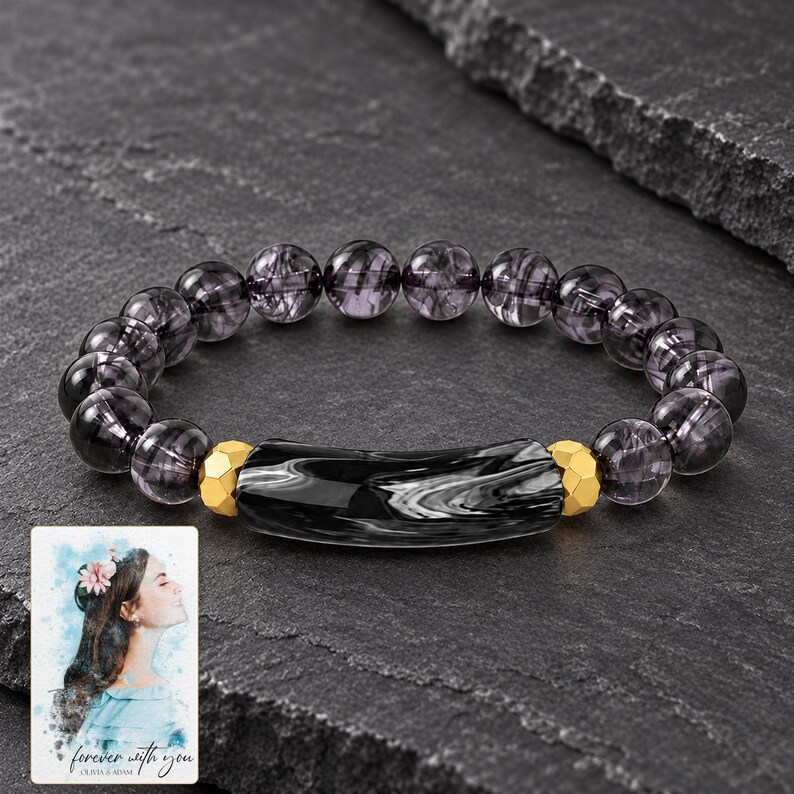 Midnight Marble Bar Bracelet styled against a dark luxury surface with the exact product finish clearly visible. A personalized digital greeting card is shown alongside.