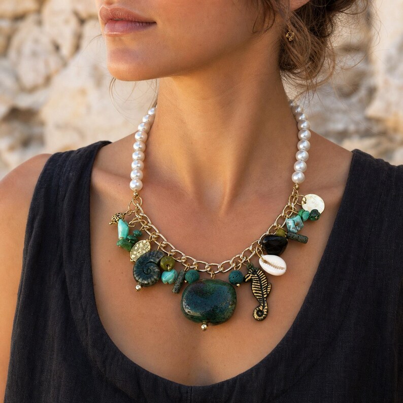 Three-piece handmade necklace set featuring silver and bronze beaded necklace, bronze and brown beaded necklace and rose gold and silver beaded necklace, displayed together to show the coordinated colors and beadwork