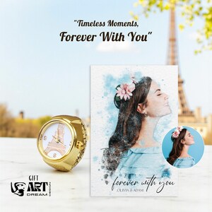 May include: A gold ring watch with a white face featuring a rose gold Eiffel Tower design. The image also includes a watercolor portrait of a woman with flowers in her hair, and the text "Timeless Moments, Forever With You."