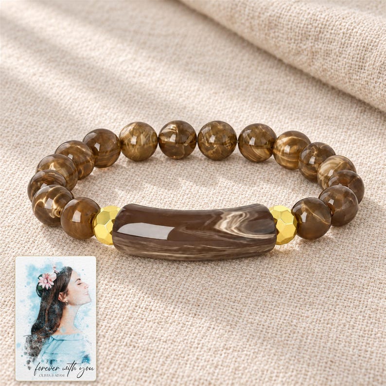 Cocoa Swirl Bar Bracelet arranged on soft ivory linen in a refined neutral flat lay. A personalized digital greeting card is shown alongside.