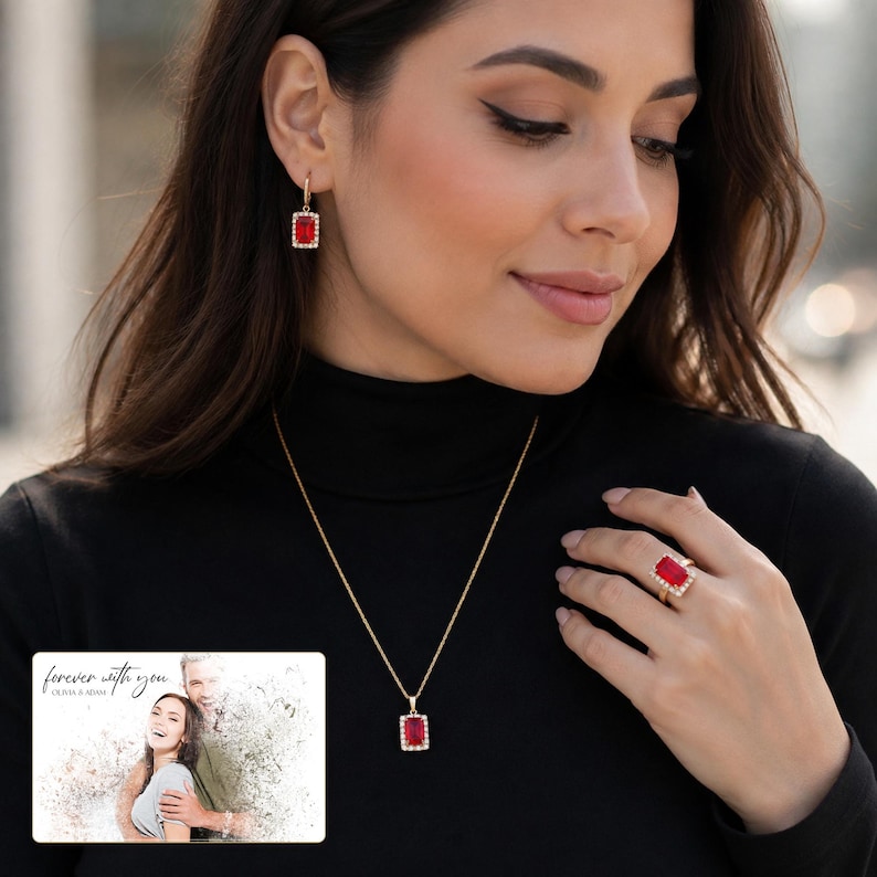 Red rectangular-stone necklace, matching earrings and ring, worn view. A personalized greeting-card example appears in the corner.