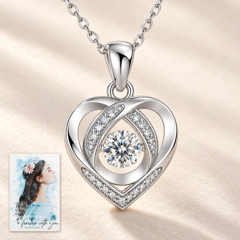 Moissanite Heart Necklace, hero view. A personalized digital greeting card is shown alongside.