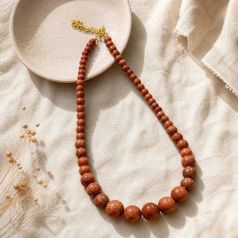 Gift ready presentation of Copper and Brown Statement Beaded Necklace, Boho Handmade Jewelry, Artisan Gift for Her in an open jewelry box lined with natural ivory linen