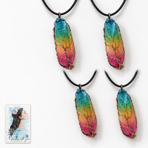Rainbow Tree Stone Necklace, shown against a light background. A sample personalized digital greeting card is shown alongside.