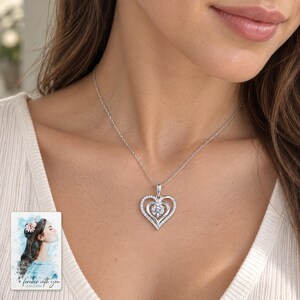 Double Heart Moissanite Necklace, worn by an adult. A sample personalized digital greeting card is shown alongside.