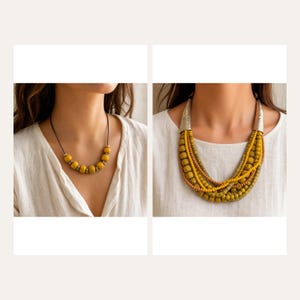 May include: A single-strand necklace featuring yellow beads separated by small metallic spacers on a dark cord, alongside a multi-strand statement necklace with layered yellow and brown beads, finished with textured silver-toned conical end caps.