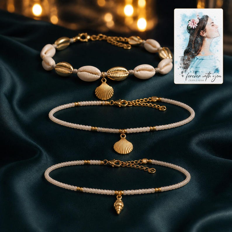 Beach Muse Three-Piece Shell Anklet Set arranged on soft ivory linen in a refined neutral flat lay.