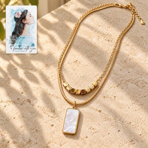 Mother of Pearl Necklace, sunlit home view. A personalized digital greeting card is shown alongside.
