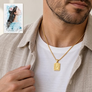 Adult man wearing the small gold tone F initial necklace with a white shirt and linen overshirt. A personalized digital greeting card is shown alongside.