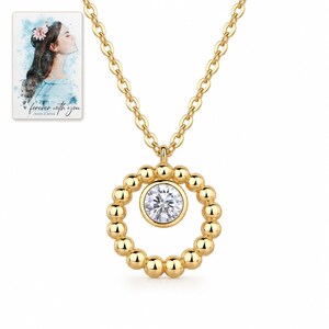 Moissanite Circle Necklace, catalog view. A personalized digital greeting card is shown alongside.