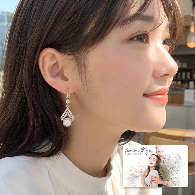 Champagne and white pearl-style chevron drop earring options displayed beside a personalized digital greeting card example. Choose one pair.