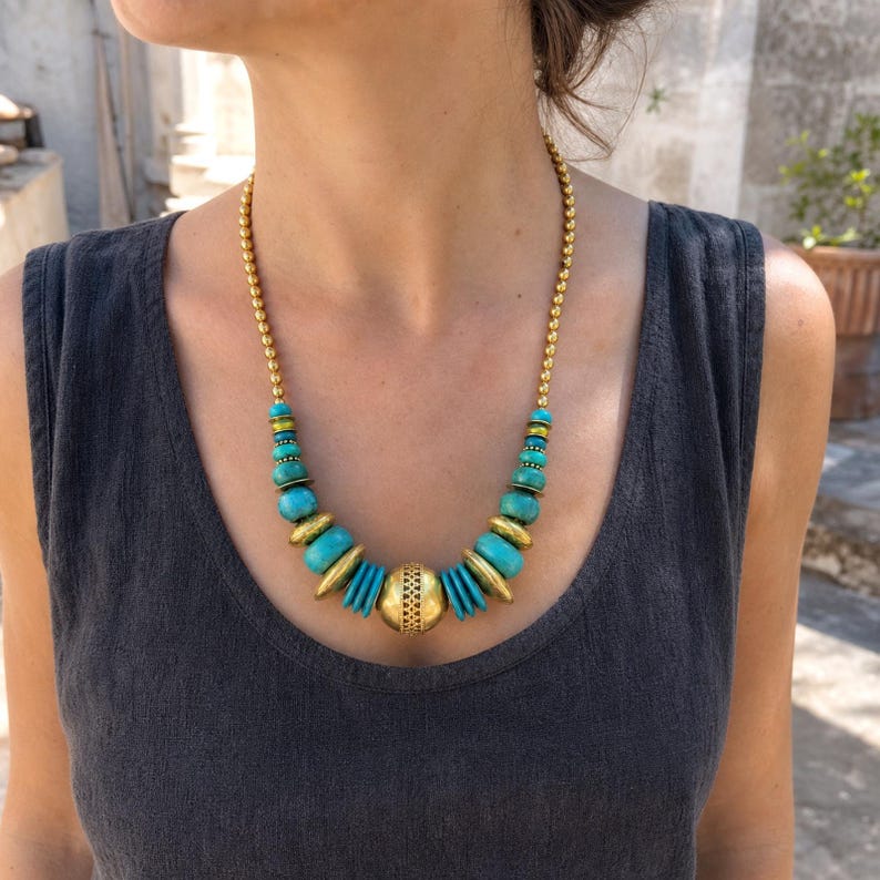 Three-piece handmade necklace set featuring gray and rose gold beaded necklace, rose gold and gray beaded necklace and rose gold and gray beaded necklace, displayed together to show the coordinated colors and beadwork