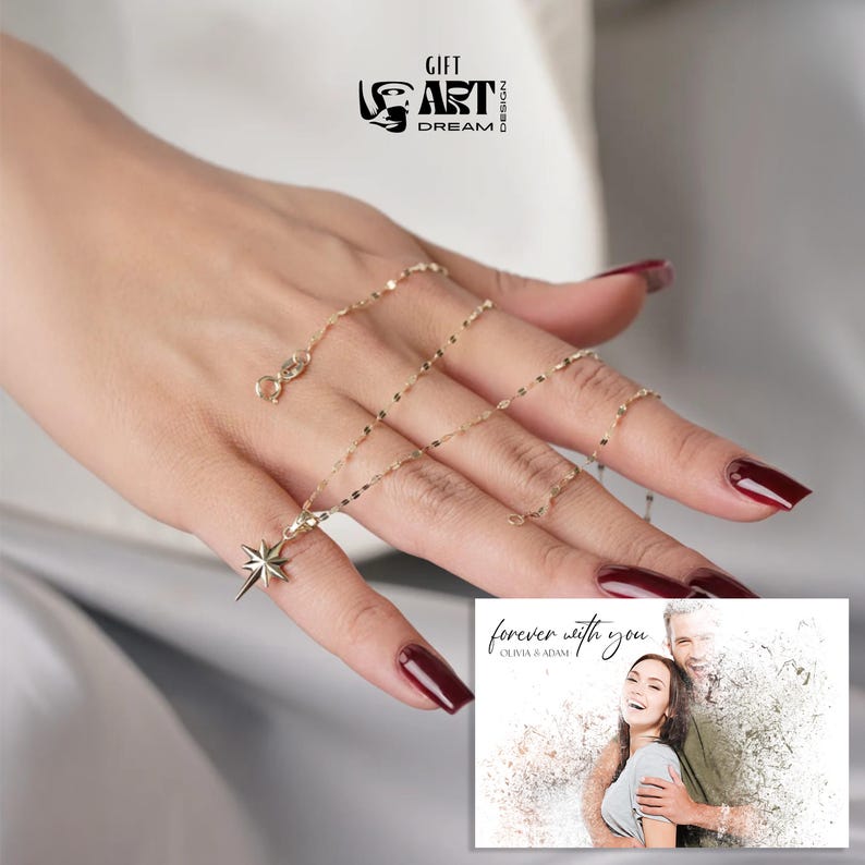 May include: A delicate gold necklace with a star pendant is displayed. The necklace is held by a person with red nail polish. A small card with the text "forever with you" and a couple's photo is in the image.