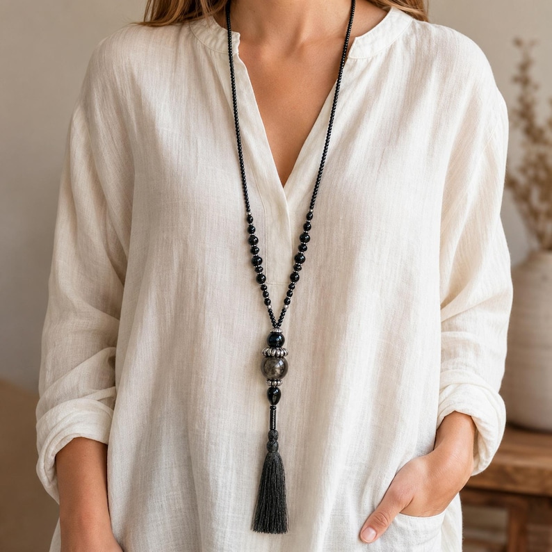 Gray and White Statement Beaded Necklace presented in an open jewelry gift box on natural linen