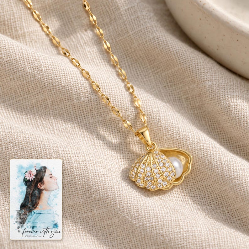 Shell Shaped Necklace, linen flatlay view. A personalized digital greeting card is shown alongside.