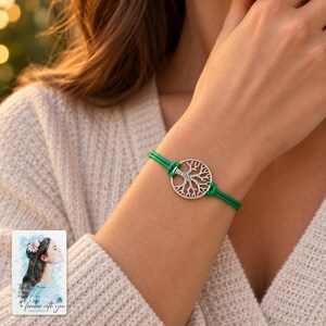 Tree of Life Cord Bracelet, worn with evening clothing. A sample personalized digital greeting card is shown alongside.