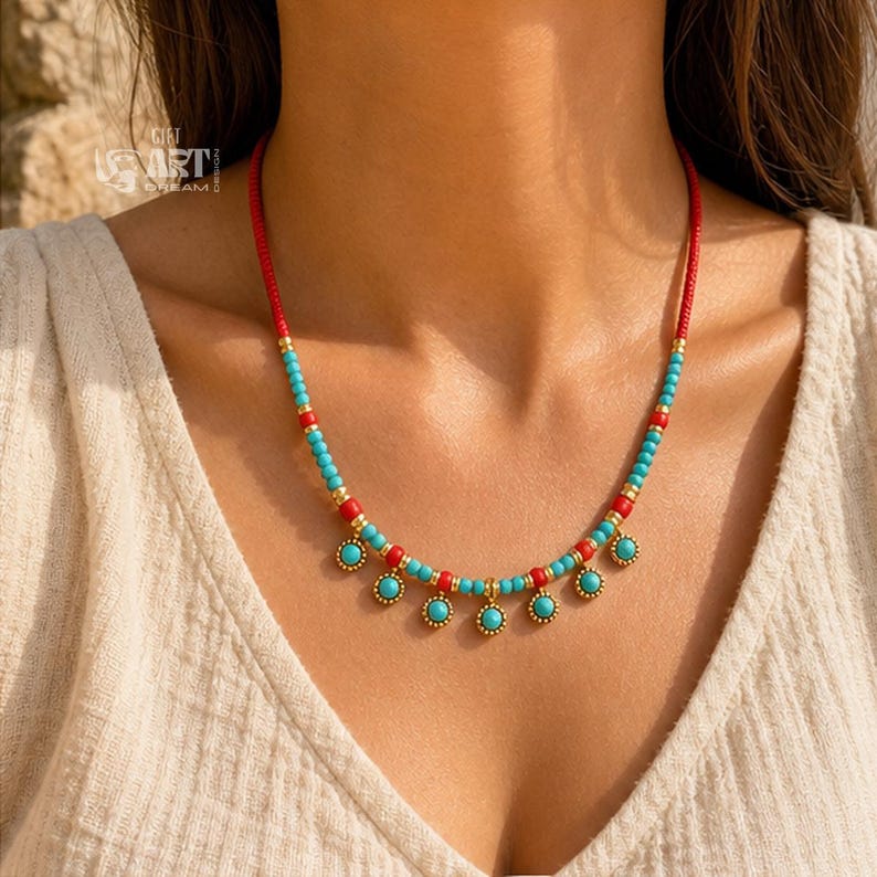 Gift box and close-up detail photo of turquoise and red beaded gold tone charm necklace for handmade jewelry gifting
