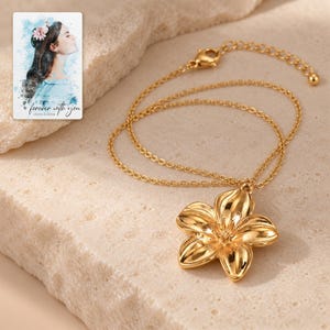 Gold Tone Flower Necklace, shown on a display surface. A sample personalized digital greeting card is shown alongside.