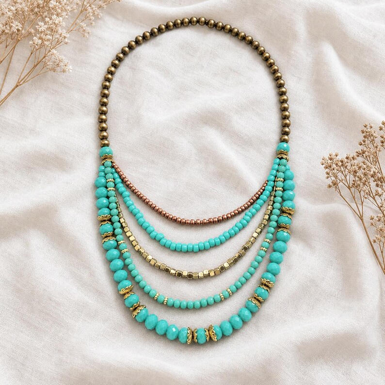 Gray and Silver Statement Beaded Necklace presented in an open jewelry gift box on natural linen