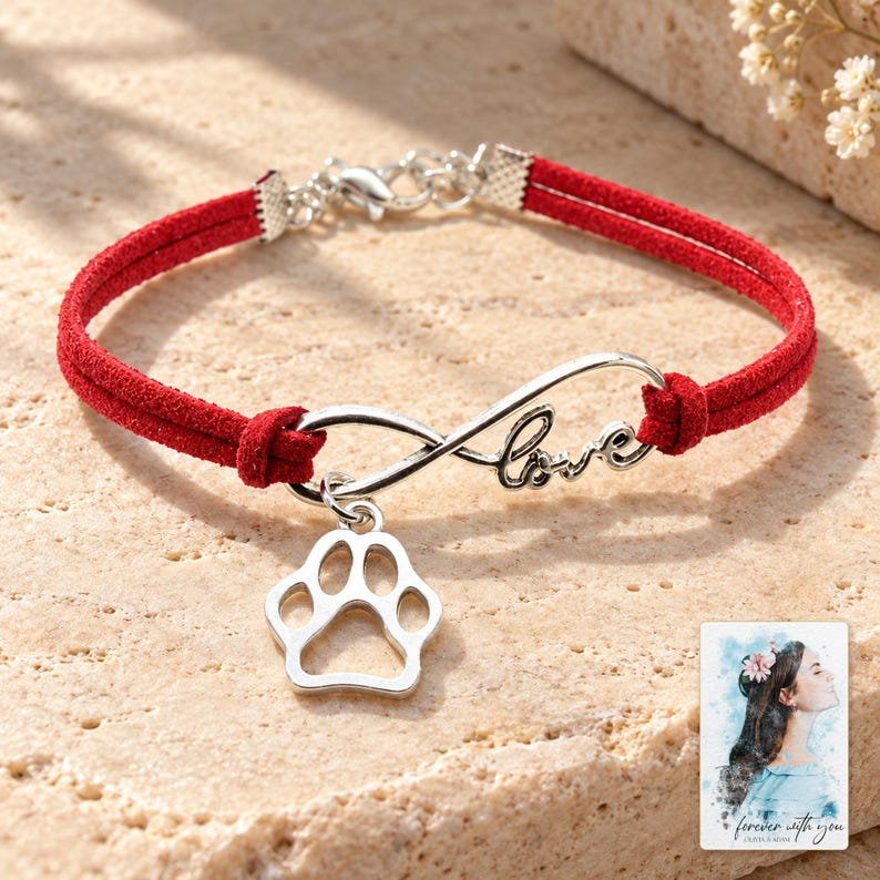 Infinity Love Paw Bracelet, shown in natural light. A sample personalized digital greeting card is shown alongside.