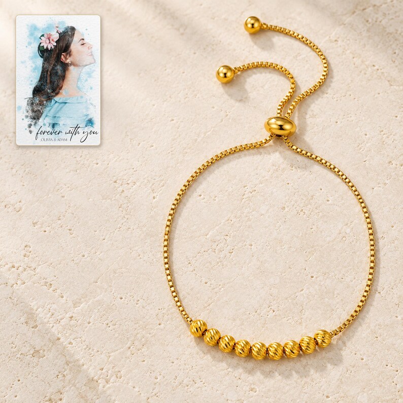 Golden Spiral Bead Slider Bracelet shown as the main Etsy hero photograph with a clear view of the complete design. A personalized digital greeting card is shown alongside.