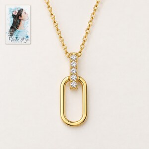 Oval Link Moissanite Necklace, shown against a light background. A sample personalized digital greeting card is shown alongside.