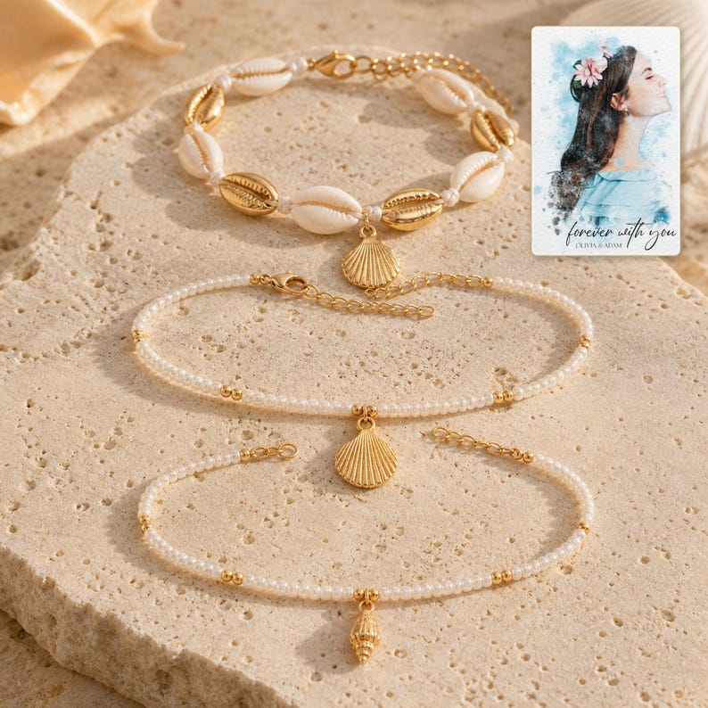Beach Muse Three-Piece Shell Anklet Set photographed in warm natural window light in an elegant home setting.