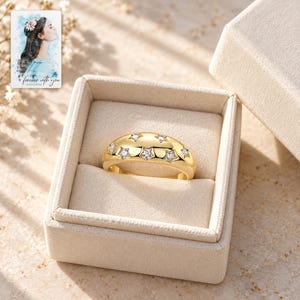 Star Set Moissanite Ring, displayed in a presentation box. A sample personalized digital greeting card is shown alongside.