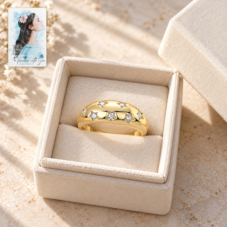 Star Set Moissanite Ring, displayed in a presentation box. A sample personalized digital greeting card is shown alongside.