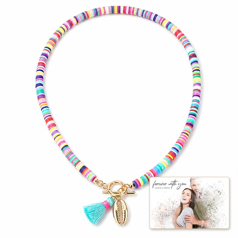 Blue Fiesta Shell Necklace shown during a believable gift-giving moment between adults with the exact jewelry visible.