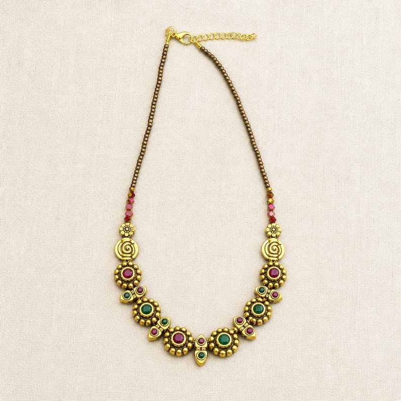 Four piece colorful handmade beaded necklace set with red turquoise green orange and multicolor boho designs