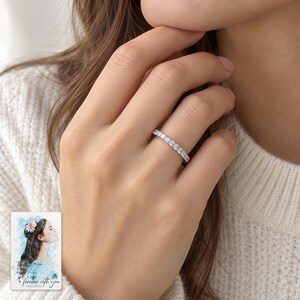Moissanite Half Eternity Ring, worn by an adult. A sample personalized digital greeting card is shown alongside.
