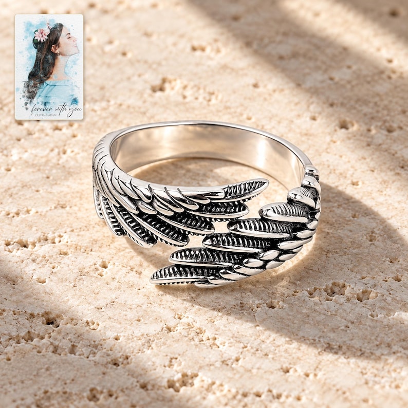 Angel Wings Wrap Ring, shown in natural light. A sample personalized digital greeting card is shown alongside.