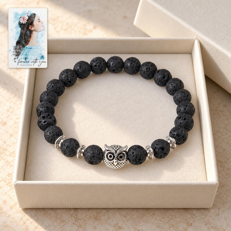 Black Lava Bead Bracelet, displayed in a presentation box. A sample personalized digital greeting card is shown alongside.