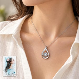 Moissanite Teardrop Necklace, worn by an adult. A sample personalized digital greeting card is shown alongside.