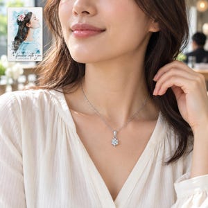 Moissanite Pendant Necklace, worn with daytime clothing. A sample personalized digital greeting card is shown alongside.