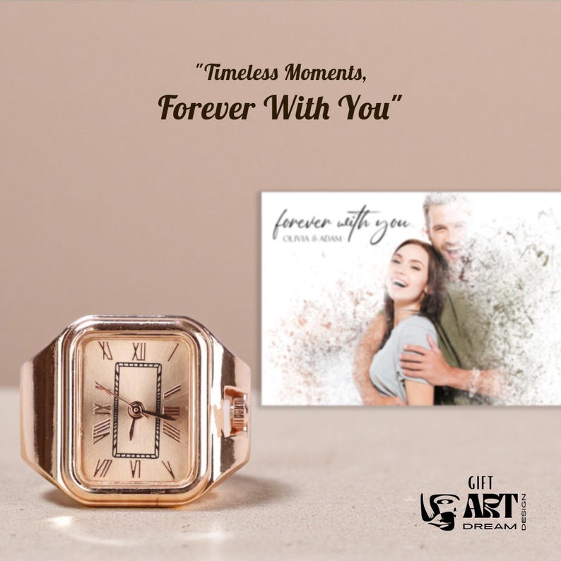 May include: A gold-toned ring watch with a rectangular face displaying Roman numerals. The watch is set against a neutral background, with a framed photo of a couple and the text "Timeless Moments, Forever With You."