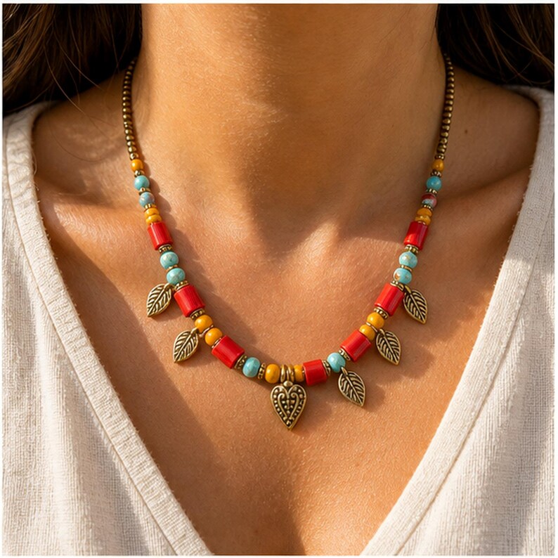 Colorful Beaded Heart Charm Necklace presented in an open jewelry gift box on natural linen