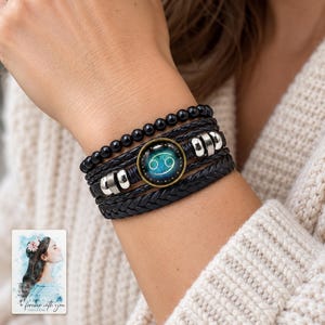 Zodiac Sign Bracelet, worn with evening clothing. A sample personalized digital greeting card is shown alongside.