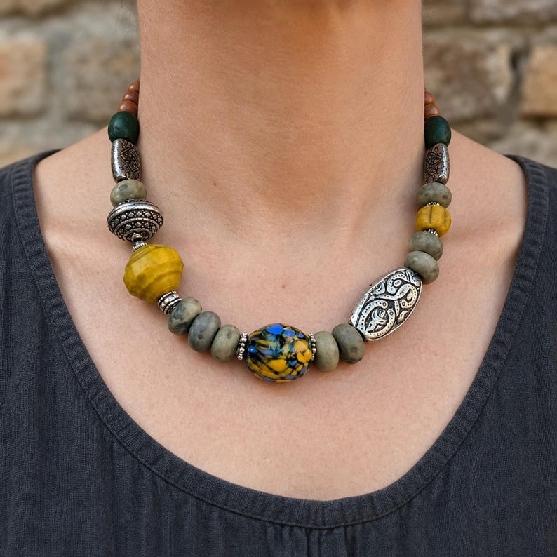 Three-piece handmade necklace set featuring rose gold and silver beaded necklace, rose gold and beige beaded necklace and rose gold and gray beaded necklace, displayed together to show the coordinated colors and beadwork