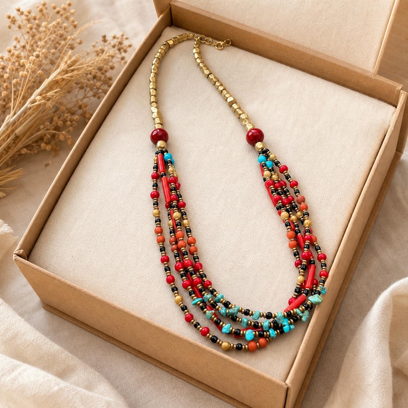 Gift ready presentation of Red and Brown Statement Beaded Necklace, Boho Handmade Jewelry, Artisan Gift for Her in an open jewelry box lined with natural ivory linen