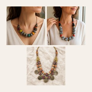 May include: Three distinct necklaces are displayed. The first features multi-colored textured beads. The second showcases black and white striped spherical beads with red accents. The third is a double-strand necklace with patterned beads and metal discs.