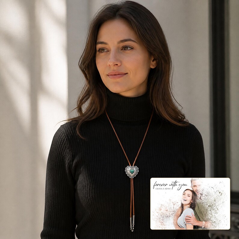 Brown cord bolo necklace with a silver-tone heart slide and turquoise-color center, worn view. A personalized greeting-card example appears in the corner.