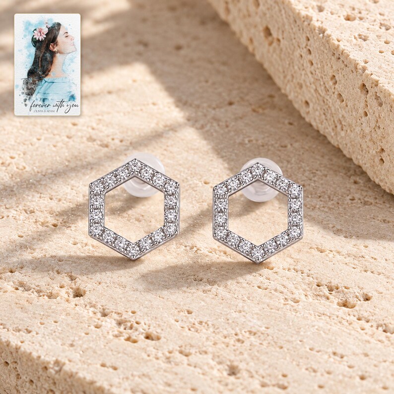 Hexagon Moissanite Stud Earrings, shown in natural light. A sample personalized digital greeting card is shown alongside.