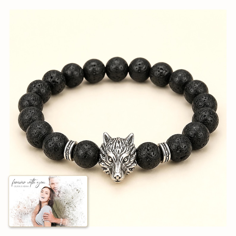 Black bead bracelet with silver-tone wolf-head detail, catalog view. A personalized greeting-card example appears in the corner.