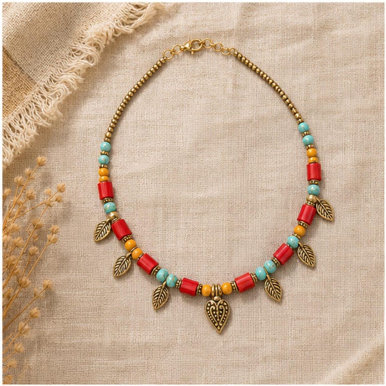 Colorful Beaded Heart Charm Necklace presented in an open jewelry gift box on natural linen