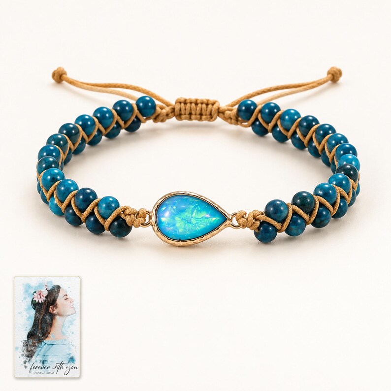 Blue Teardrop Cord Bracelet, shown against a light background. A sample personalized digital greeting card is shown alongside.