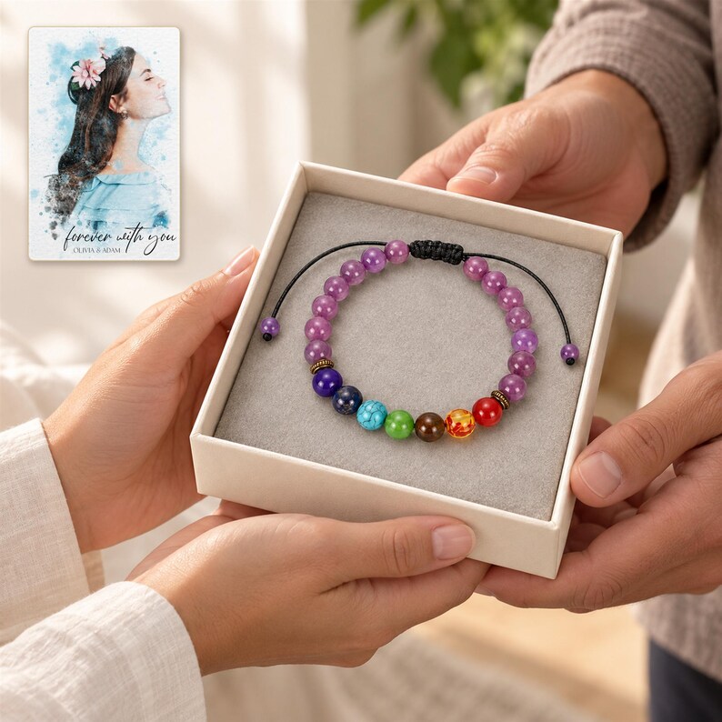 Violet Spectrum Cord Bracelet shown during a believable gift-giving moment between adults with the jewelry visible. A personalized digital greeting card is shown alongside.