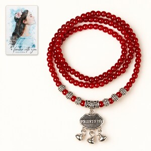 Crimson Agate style Charm Wrap Bracelet shown on a clean white catalog background for an unobstructed product view. A personalized digital greeting card is shown alongside.